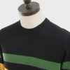 ART GALLERY CLOTHING SIXTIES MOD STYLE KNITWEAR SCENE Black, crew neck pullover with isle green & mustard horizontal placed stripes on body front, back & sleeves. The ‘SCENE’ crew neck is a classic mod knit with a retro football shirt appearance. Wear with denim & plimsolls for a casual look or with trousers & loafers for a smarter ivy league style.