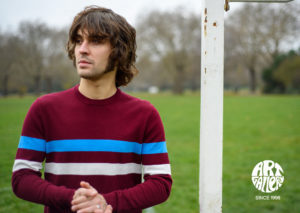 ART GALLERY CLOTHING SIXTIES MOD STYLE KNITWEAR SCENE Wine, crew neck pullover with ibiza blue & off white horizontal placed stripes on body front, back & sleeves. The ‘SCENE’ crew neck is a classic mod knit with a retro football shirt appearance. Wear with denim & plimsolls for a casual look or with trousers & loafers for a smarter ivy league style.