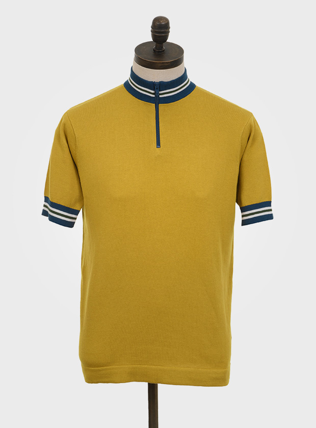 ART GALLERY CLOTHING SIXTIES MOD STYLE KNITWEAR HOBAN Mustard, short sleeved quarter zip knitted cycling style top with isle green & off white tipping on sailor blue neck & cuffs.